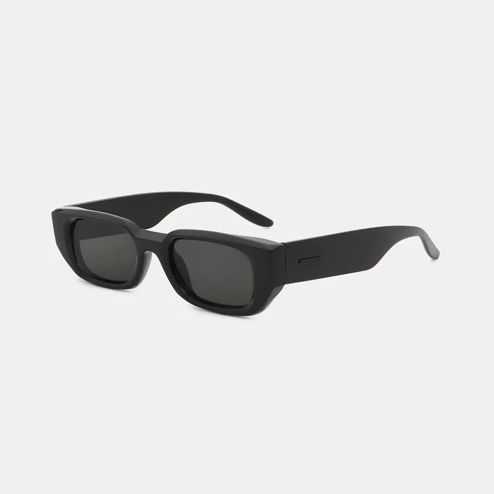 Black angular acetate sunglasses with thick frames and dark lenses.