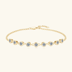 Gold-plated tennis bracelet with bezel-set moissanite stones