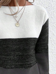 Colorblock boatneck ribbed knit sweater in white, black, and gray.