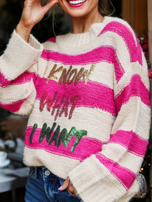 Bold sequin graphic colorblock knit sweater with crew neck and long sleeves.
