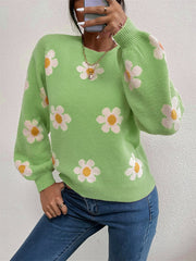 Mid Green knit sweater with white daisy pattern and puff sleeves.