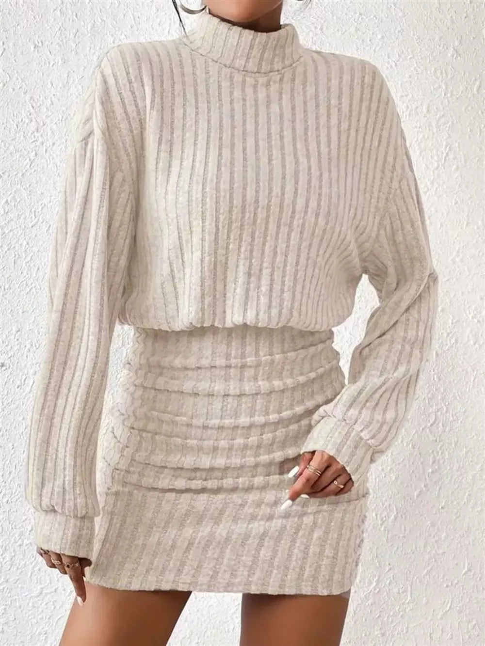 Cozy ribbed turtleneck mini dress in Dust Storm with ruched detail and long sleeves.