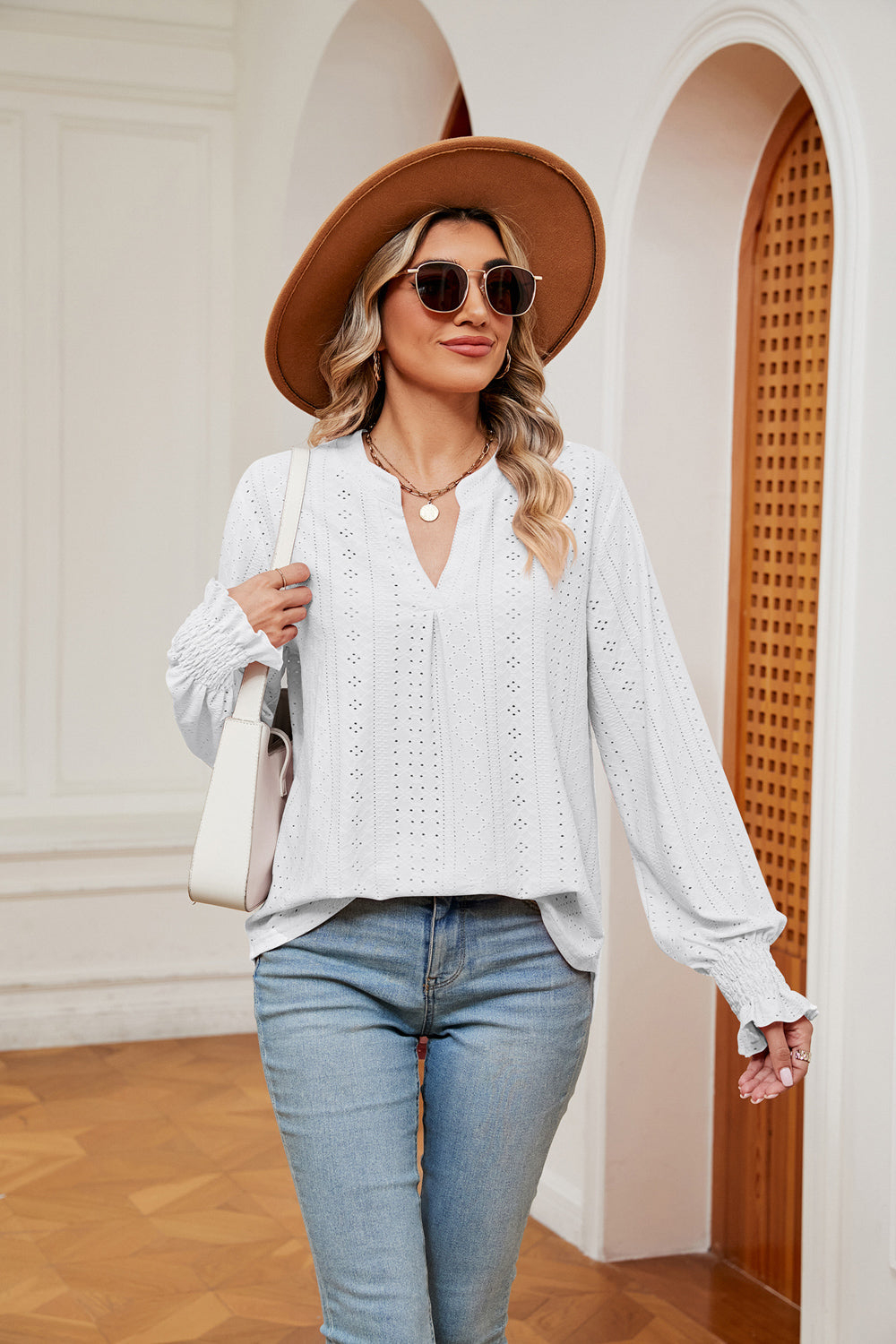 White eyelet detail blouse with V-neck and poet sleeves