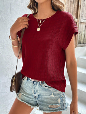 Burgundy woven texture cap-sleeve blouse with a relaxed fit