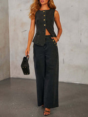 Dark wash wide-leg jeans with nautical button detail on the side pocket.