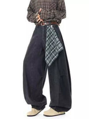 Belted wide-leg vintage wash jeans with a plaid accent detail.