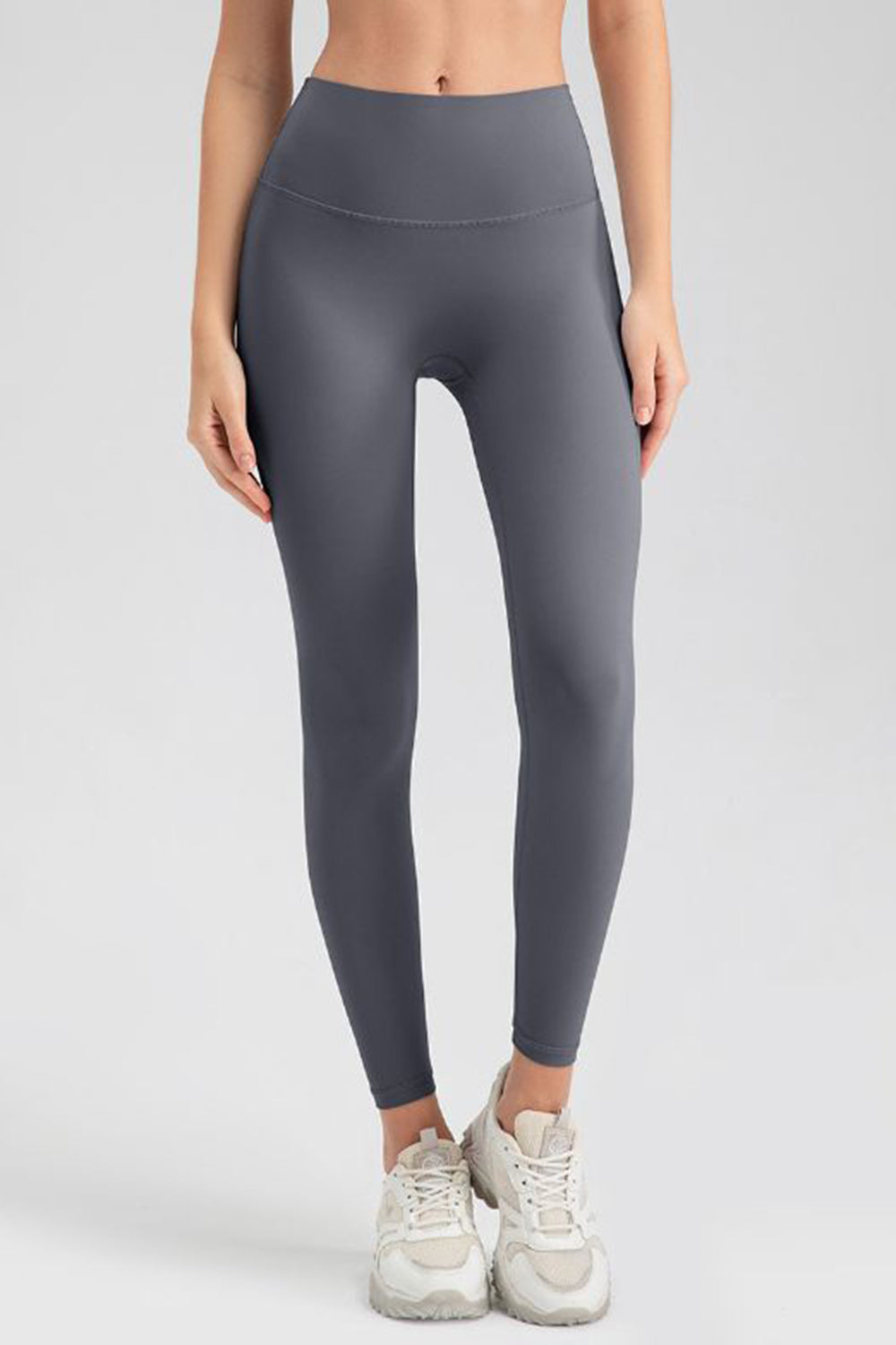 Women's charcoal high-waisted sculpted contour leggings with a seamless waistband.