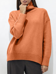 Orange ribbed turtleneck sweater with relaxed fit and ribbed cuffs and hem.