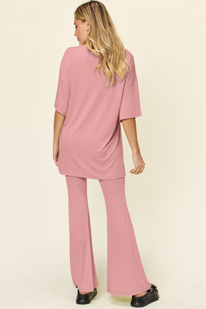 Dusty pink oversized tee and flare leg pants set