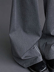 Men's relaxed fit sweatpants in charcoal grey, ankle length, with visible stitching detail.