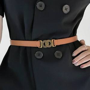 Brown vegan leather belt with interlocking gold buckle detail.