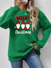Green Christmas gnome graphic sweatshirt with Merry Christmas text and snowflakes.