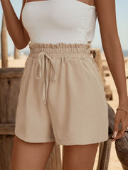 Tan paperbag waist shorts with tie front and elastic waistband, casual women's shorts.
