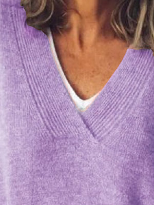 Relaxed lavender ribbed knit sweater with a V-neck.