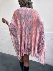 Knit wrap coat with fringe hem and multicolor yarn dye pattern.