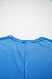 Blue mineral wash cotton tee with crew neck and center seam detail.