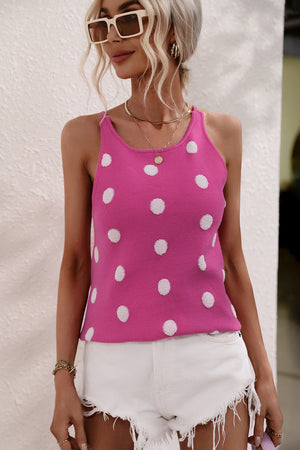 Hot pink polka dot knit tank top with a keyhole neckline.