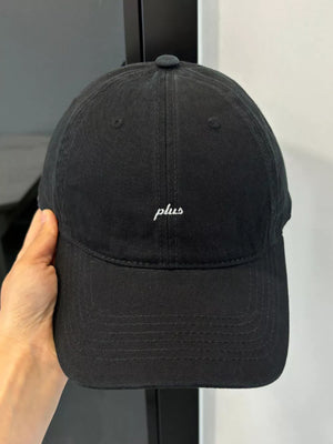 Black baseball cap with embroidered white "plus" detail