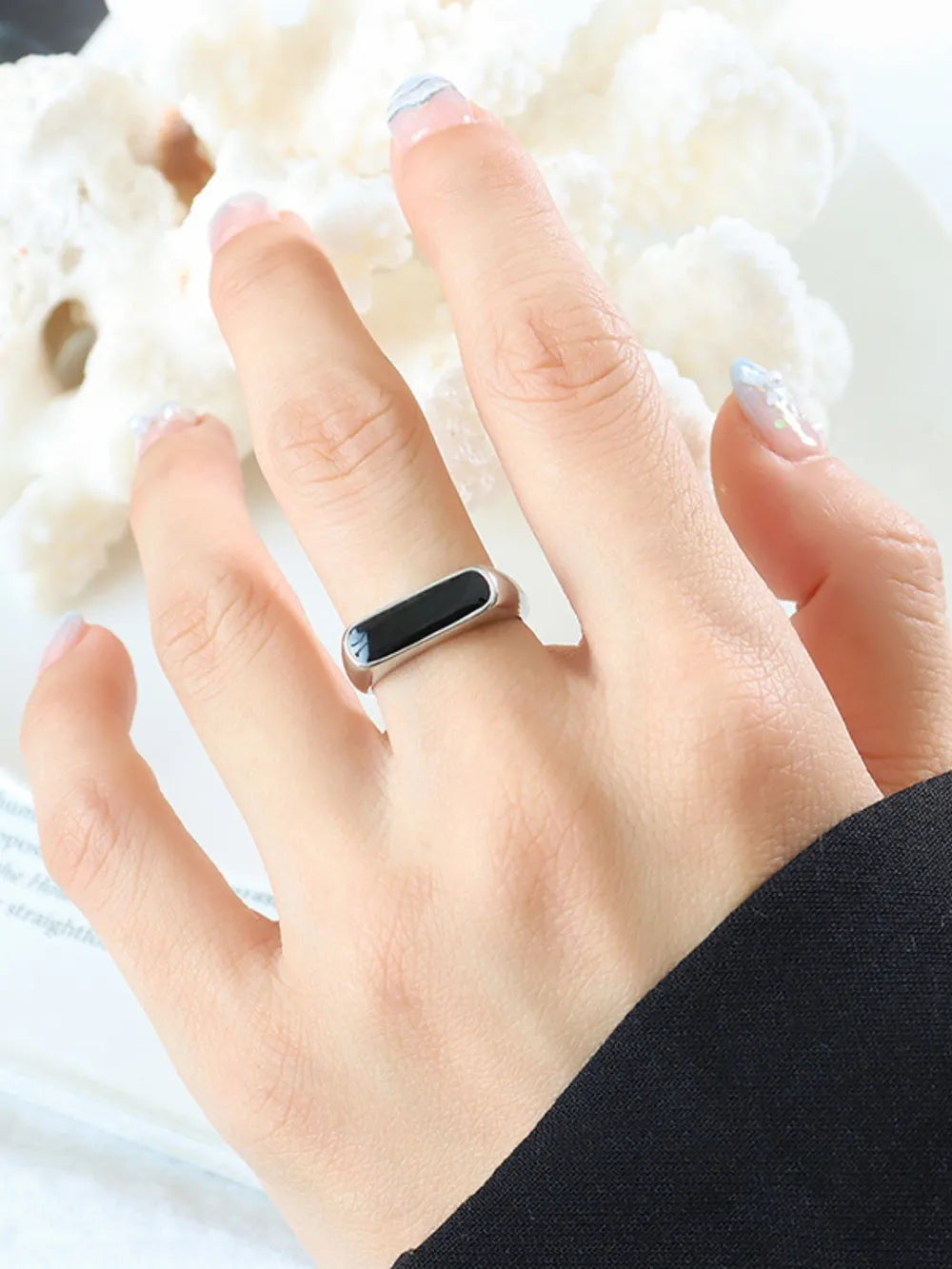 Silver signet ring with black enamel inlay detail