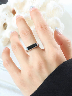Silver signet ring with black enamel inlay detail