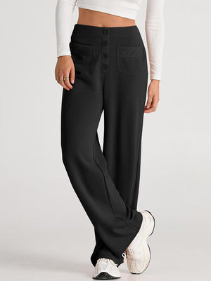 Black button-front palazzo trousers with flap pockets and a wide leg.