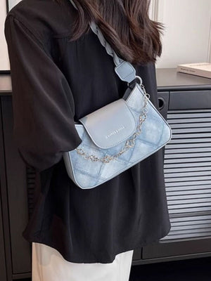 Blue textured leather shoulder bag with chain strap and braided detail