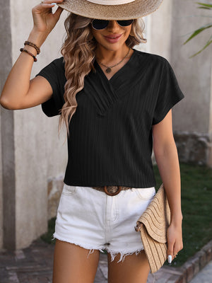 Black textured V-neck tee with short sleeves and a surplice neckline.