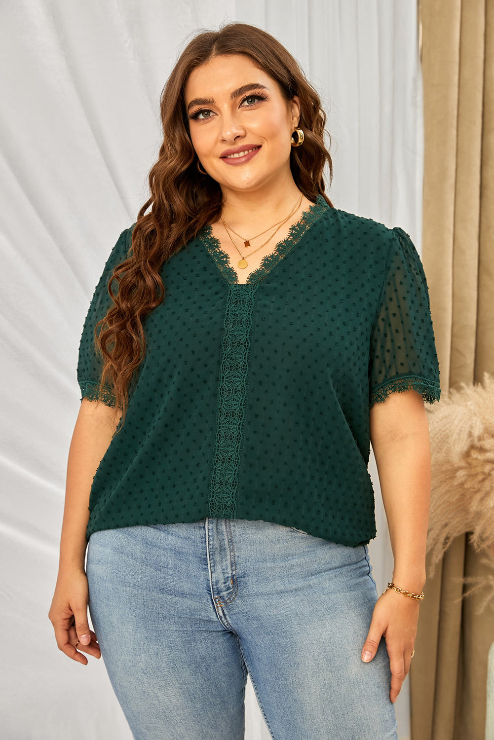 Dark green textured dot blouse with lace trim V-neck and short sleeves