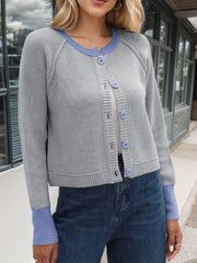 Gray knit cardigan with blue collar and cuffs, button front, raglan sleeves