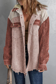 Colorblock corduroy hooded utility jacket with frayed hem and contrast sleeves.