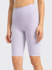 Sculpted active bike shorts in Heliotrope Purple with a high waist and seamless design.