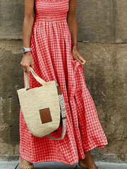 Red gingham ruffled sleeve maxi dress with smocked bodice and tiered skirt.