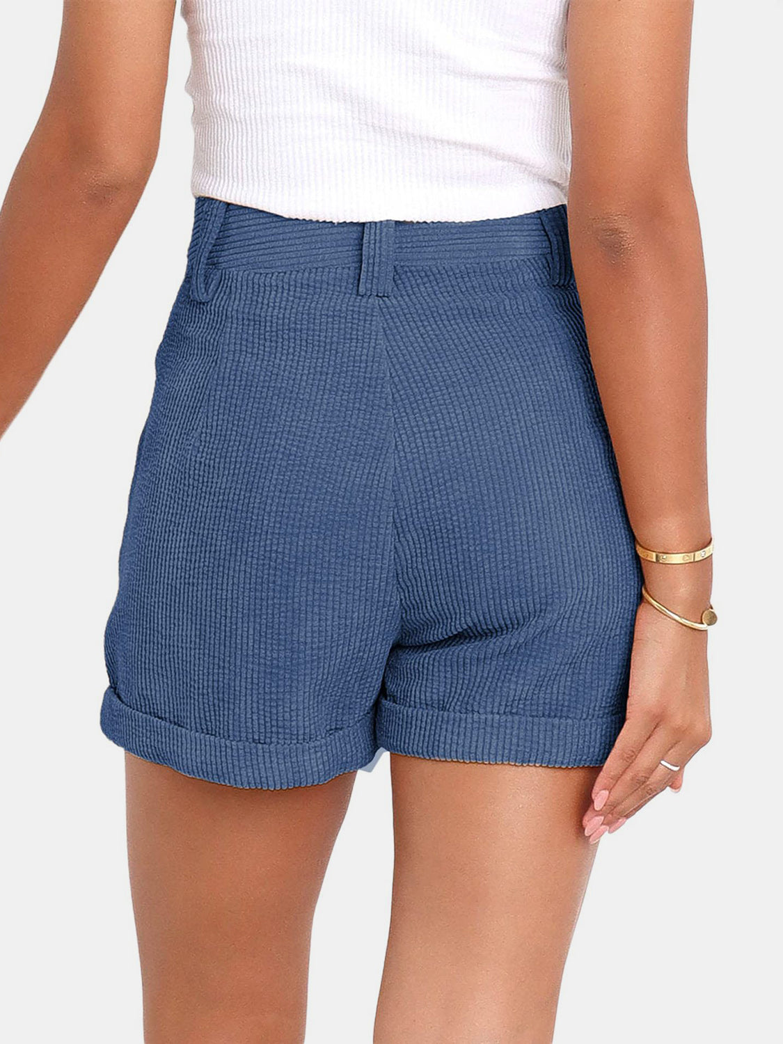 Dusty Blue corduroy high-waist shorts with pleats and cuffed hem.