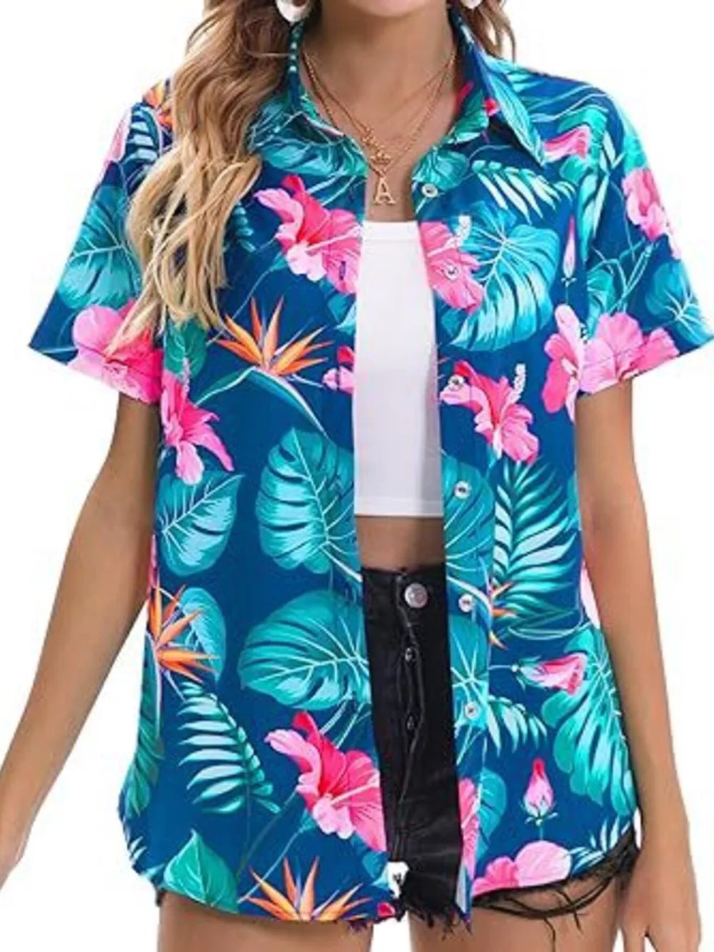 Tropical hibiscus print button-up shirt in blue with short sleeves and a collared neckline.