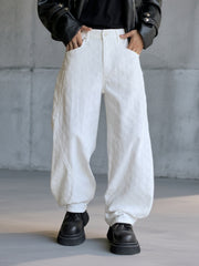 White textured cotton wide-leg jeans for men with curved seams.