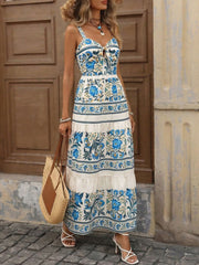 Blue floral maxi dress with tie-front bodice and tiered skirt