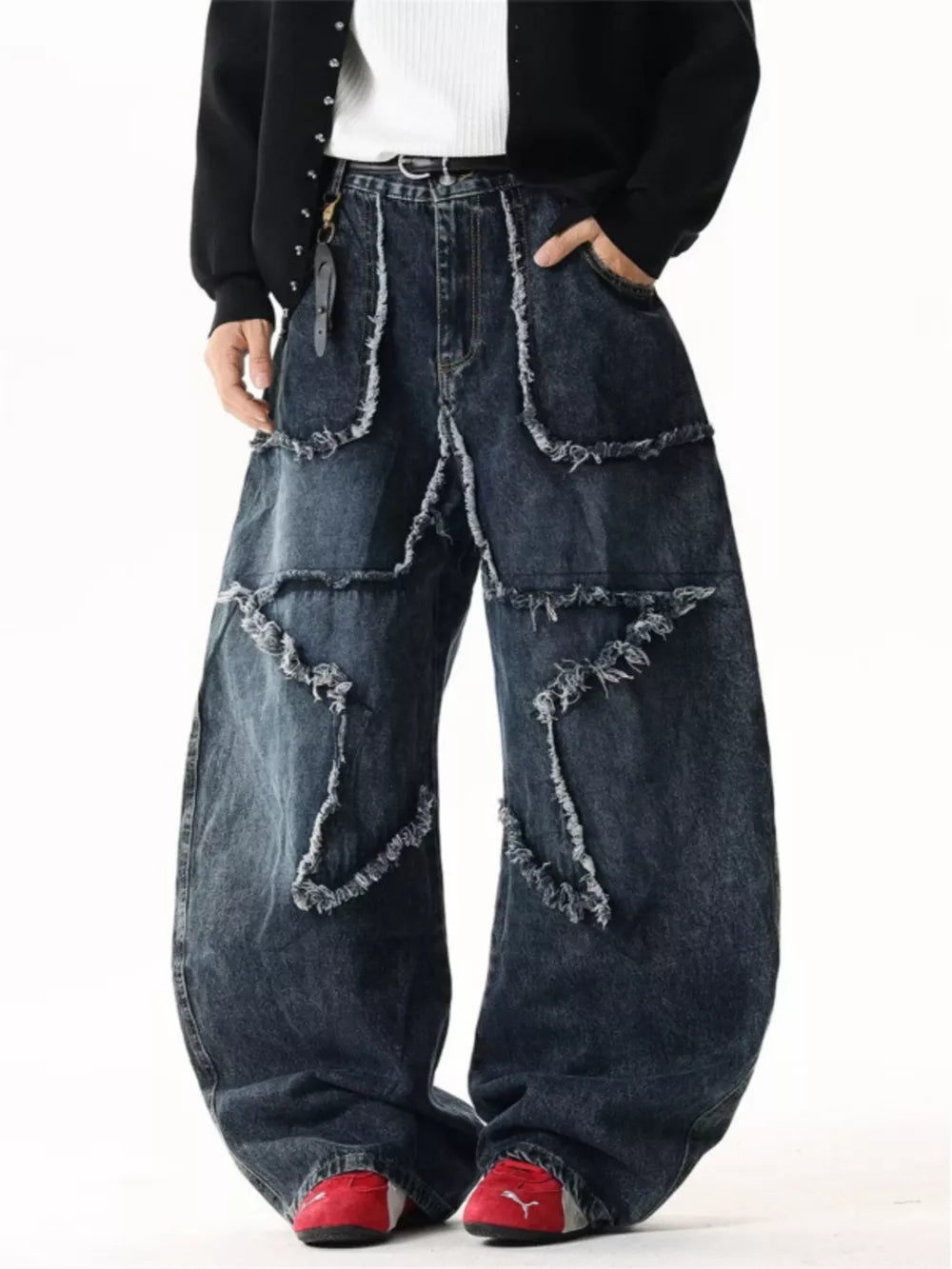 Star Patchwork Distressed Wide Leg Jeans in dark wash denim with frayed details.