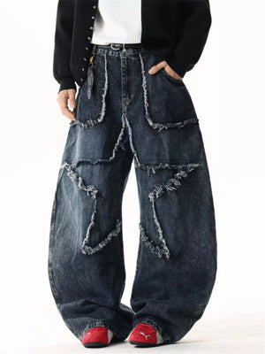 Star Patchwork Distressed Wide Leg Jeans in dark wash denim with frayed details.
