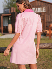 Button-down puff sleeve mini dress in pink and white stripe cotton with a contrast collar.
