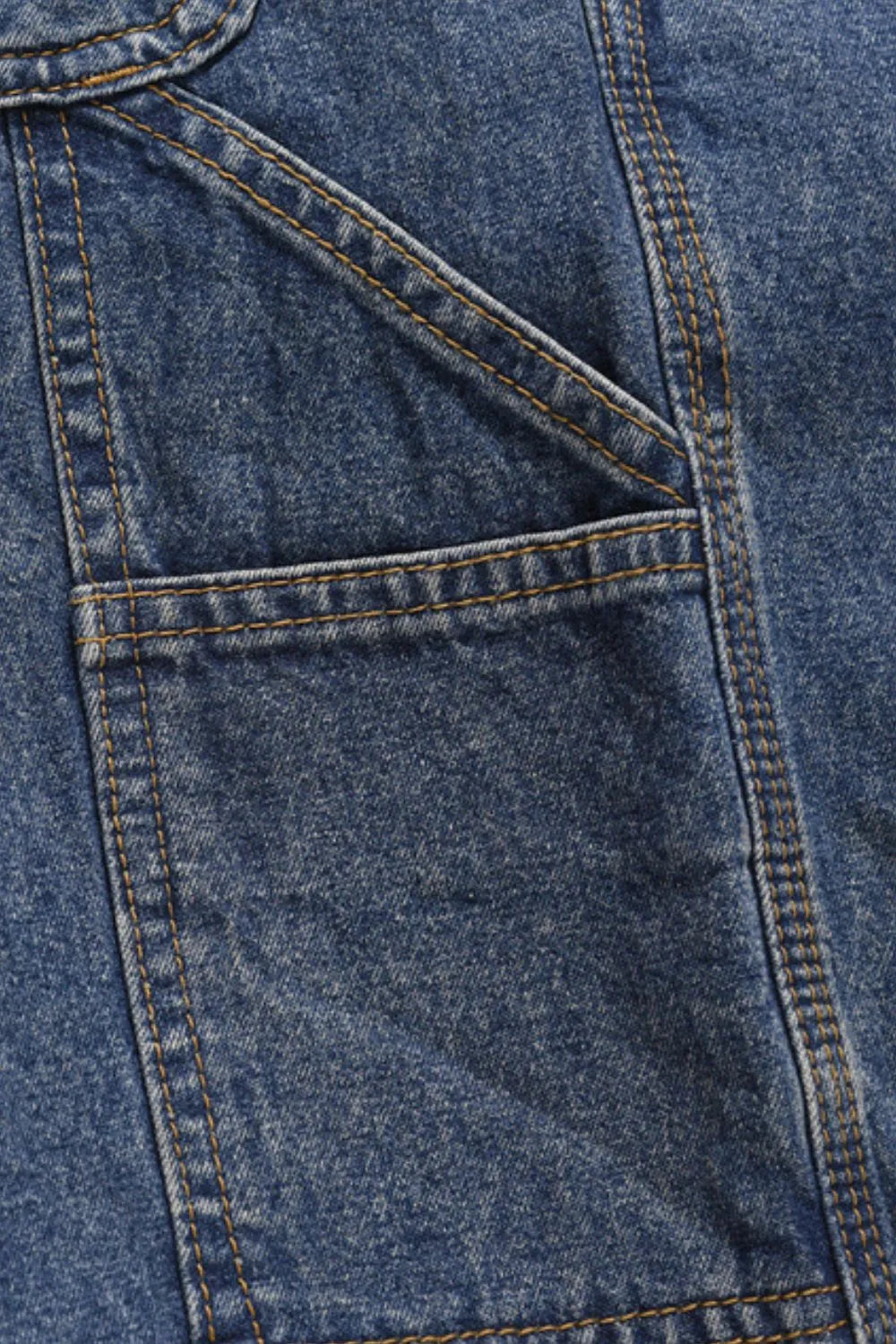 Carpenter denim bermuda shorts in medium wash with contrast stitching and a utility pocket detail.