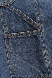 Carpenter denim bermuda shorts in medium wash with contrast stitching and a utility pocket detail.