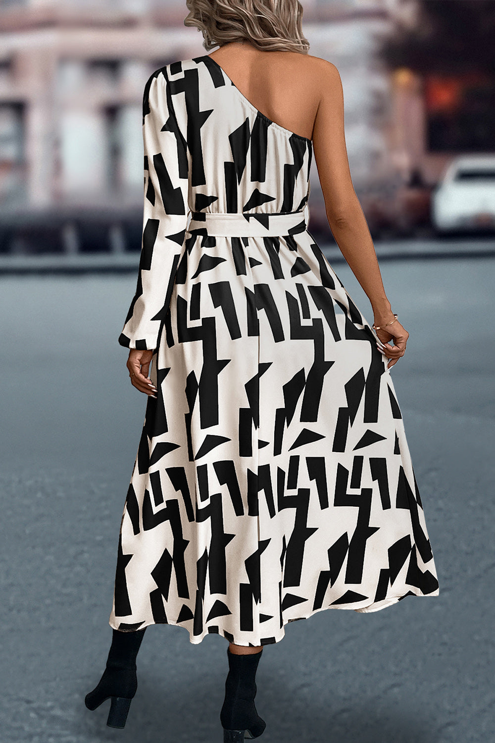 Geometric print asymmetric maxi dress with belt in black and white.