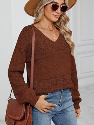 Brown diamond eyelet knit V-neck sweater with long sleeves.