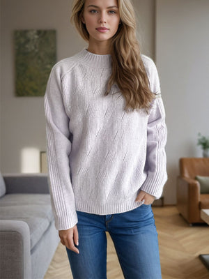 Lilac textured knit raglan sleeve pullover sweater with mock neck and cable knit detail.