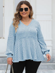 Pastel Blue ribbed peplum knit top with blouson sleeves and V-neck.