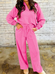 Hot pink collared pullover and wide-leg pants set with drawstring waist and seam detail.