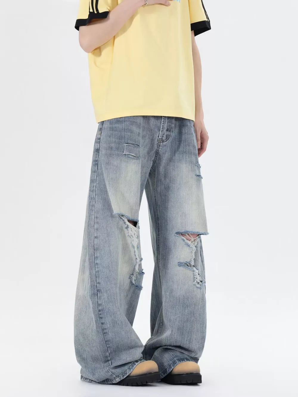 Men's light wash distressed wide-leg jeans, 100% cotton, relaxed fit