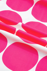 Polyester frill tank top with playful pink polka dots on white fabric.