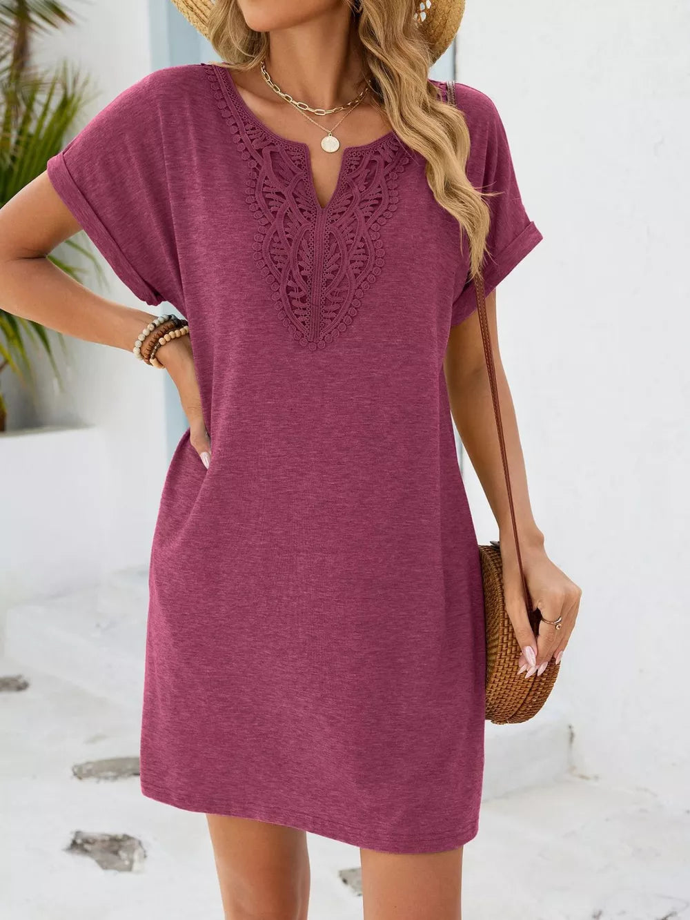 Deep purple lace-trimmed V-neck pocket dress with cuffed short sleeves.