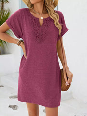 Deep purple lace-trimmed V-neck pocket dress with cuffed short sleeves.